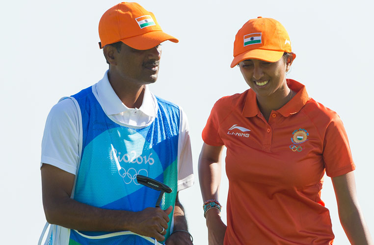 RIO DE JANEIRO, BRAZIL - 17/08/2016: Aditi Ashok of India and her father/caddie during the first round at the Rio 2016 Olympic Games, Reserva de Marapendi Golf Course, Barra Da Tijuca, Rio De Janeiro, Brazil. (Photo by Tristan Jones/IGF)