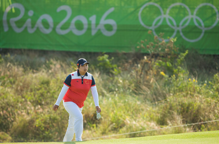 RIO DE JANEIRO, BRAZIL - 19/08/2016: Shanshan Feng of China walks up to the 16th green during the third round at the Rio 2016 Olympic Games, Reserva de Marapendi Golf Course, Barra Da Tijuca, Rio De Janeiro, Brazil. (Photo by Tristan Jones/IGF)