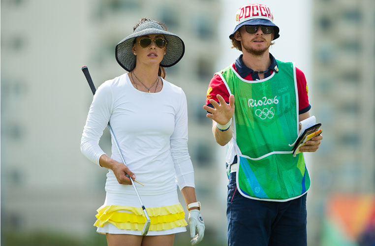 RIO DE JANEIRO, BRAZIL - 20/08/2016: Maria Verchenova of Russia discusses the line of the 10th tee with her caddie during the final round at the Rio 2016 Olympic Games, Reserva de Marapendi Golf Course, Barra Da Tijuca, Rio De Janeiro, Brazil. (Photo by Tristan Jones/IGF)