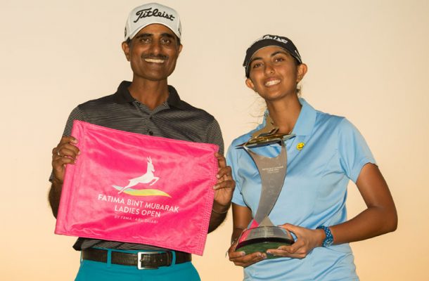 04/11/2017 Ladies European Tour 2017: Fatima Bint Mubarak Ladies Open, Saadiyat Beach Golf Club. November 1 -4 2017. Aditi Ashok of India with the trophy and her father and caddie for the week, Ashok. Credit: Tristan Jones.